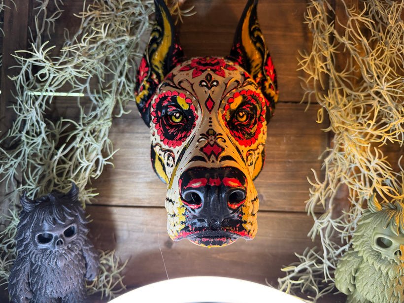 Gatefang Vault Sealed sugar skull dog wall art by Fiendworks Studio, with pointed ears and red, yellow, cream and black details, view 1