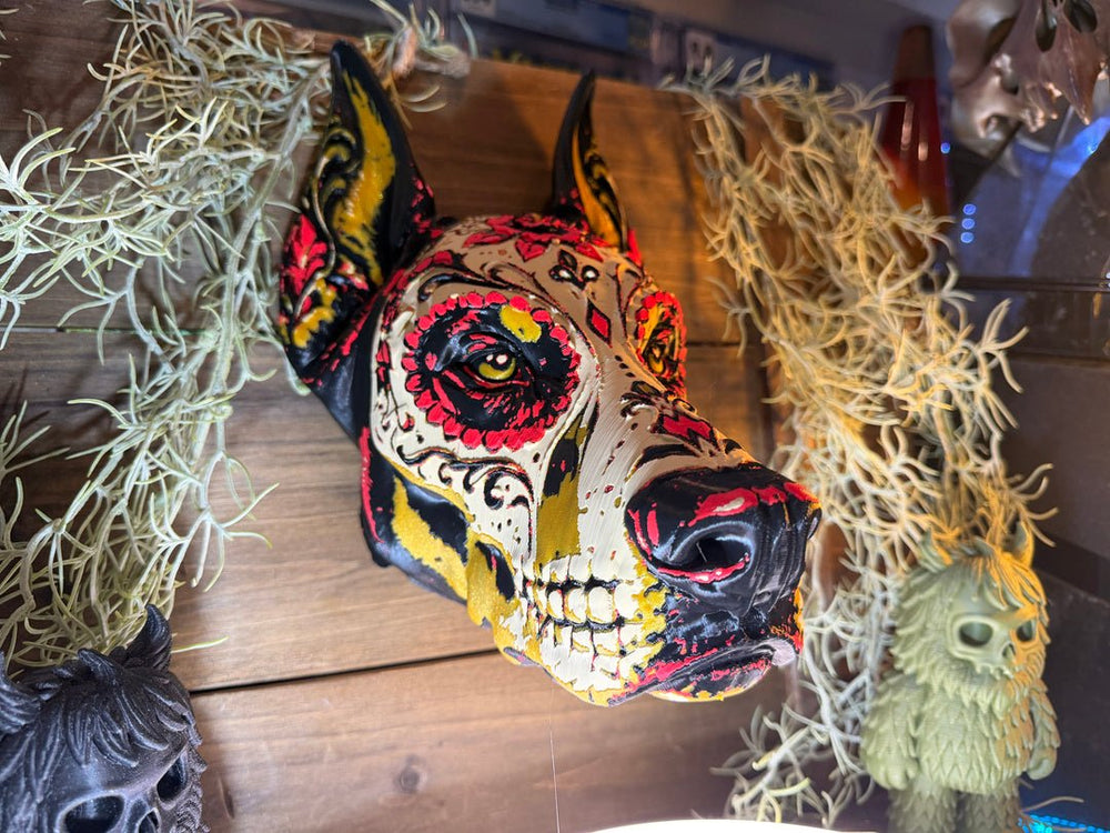 Gatefang Vault Sealed sugar skull dog wall art by Fiendworks Studio, with pointed ears and red, yellow, cream and black details, view 2